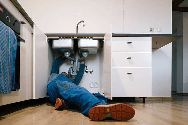 Professional Drain Cleaning technician working in Lynchburg, MO